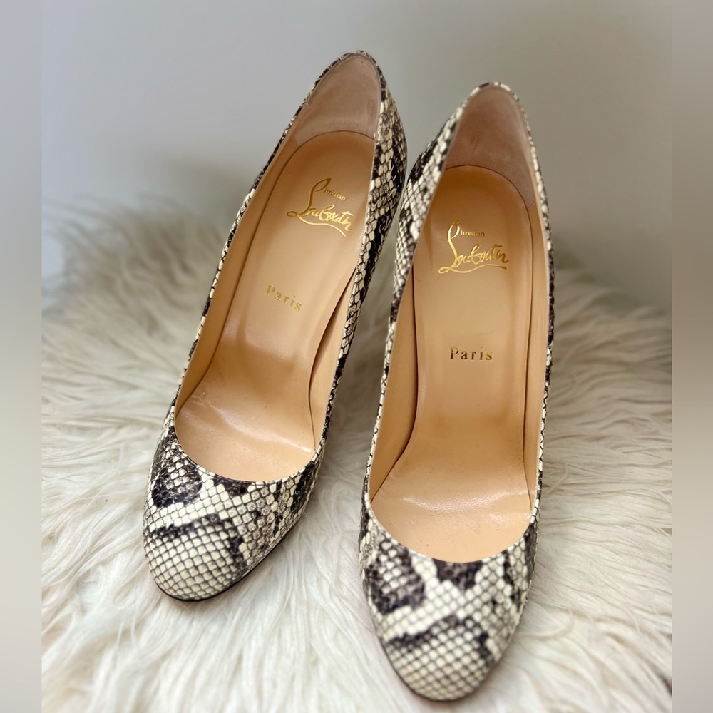 CHRISTIAN LOUBOUTIN Lou Spikes python trainers. Size: 39